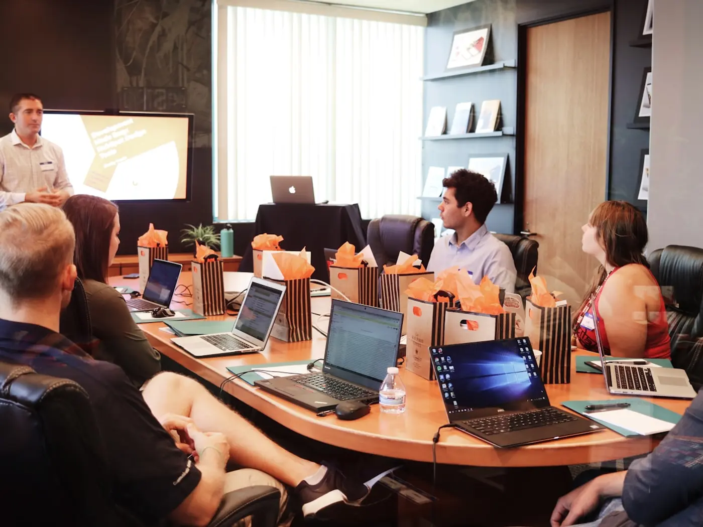 Professionals reviewing documents and notes together